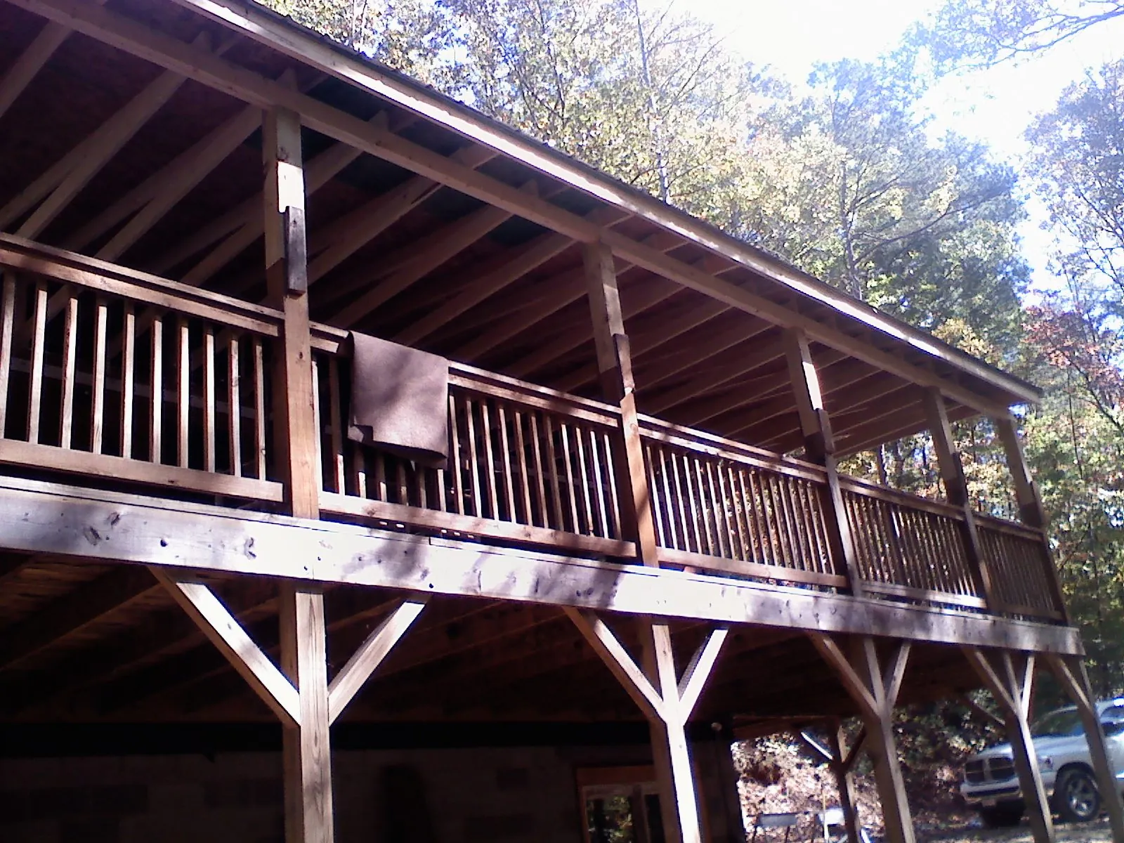 Timber framing under a new elevated porch and deck — Roof Leak Repair in Thompson Ridge by Roofing Brothers